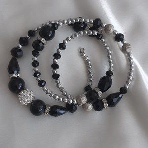 Jacqueline Kent bracelet. Beaded wrap around cuff  Silver & black. Stret…